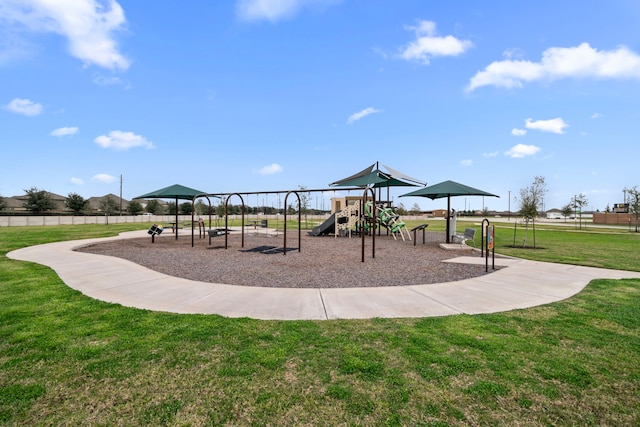 view of jungle gym featuring a lawn