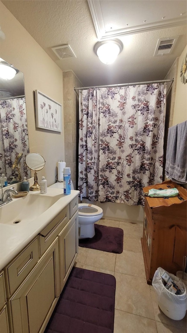 full bathroom featuring shower / bathtub combination with curtain, tile patterned flooring, a textured ceiling, toilet, and vanity