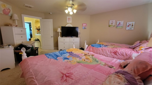 bedroom featuring light carpet and ceiling fan