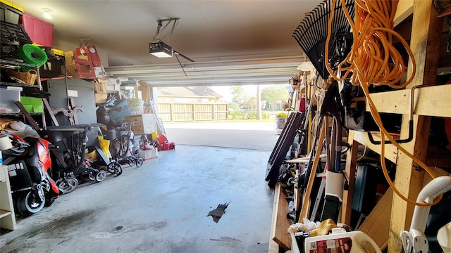 garage featuring a garage door opener