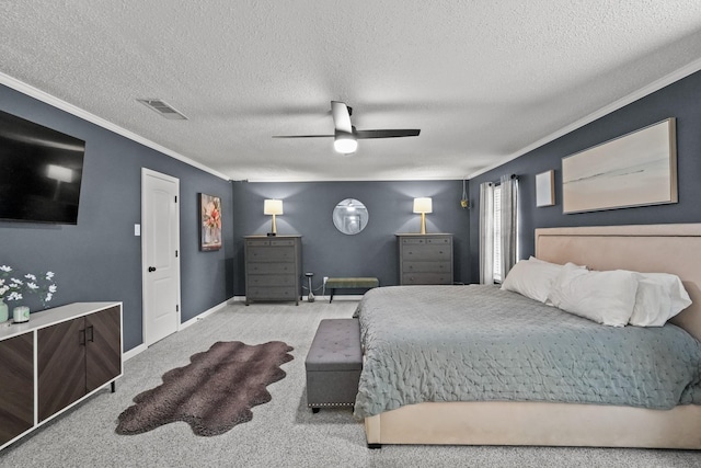 carpeted bedroom with ceiling fan, crown molding, and a textured ceiling