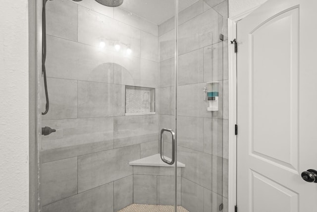 bathroom featuring an enclosed shower