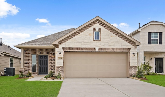 view of front of home with central AC and a front lawn