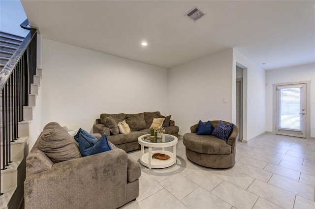 living room with light tile patterned floors