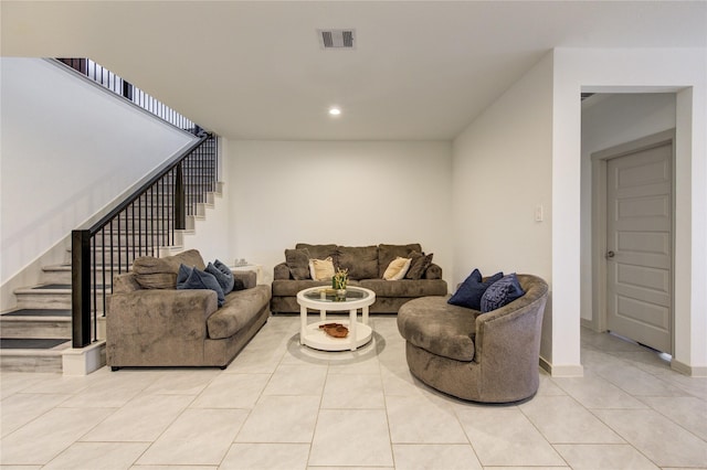 living room with light tile patterned floors