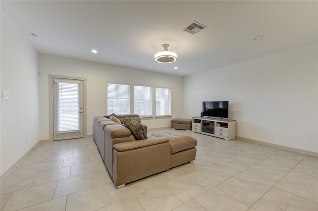 living room with light tile patterned flooring