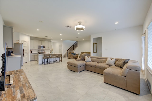 living room with sink