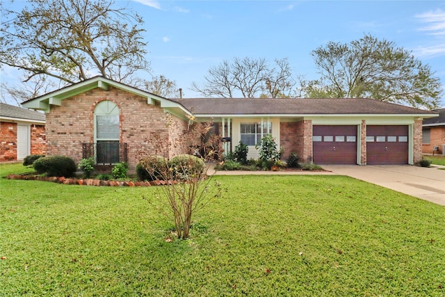 view of front facade featuring a front lawn and a garage