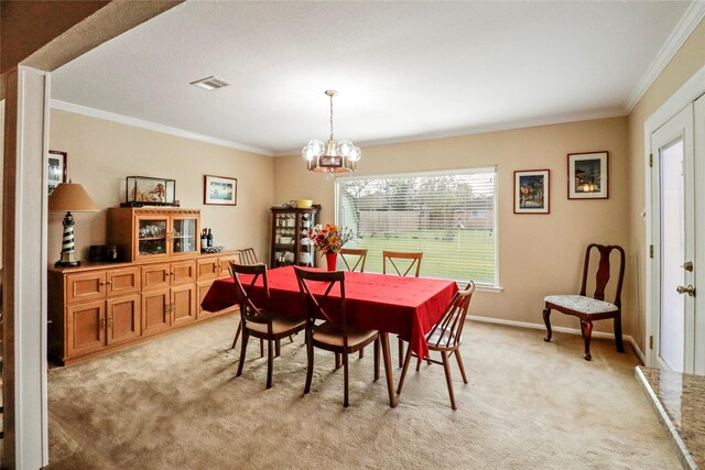 dining space with baseboards, visible vents, an inviting chandelier, ornamental molding, and light carpet