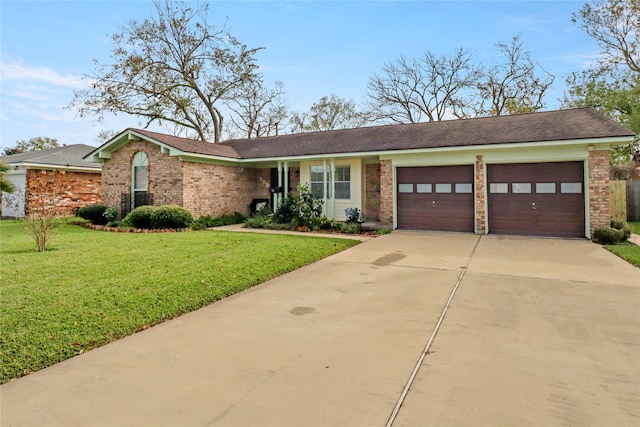 single story home with a front lawn and a garage