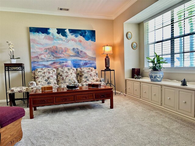 office area featuring visible vents, baseboards, light colored carpet, and ornamental molding