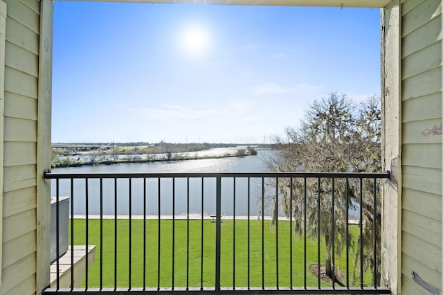 balcony featuring a water view