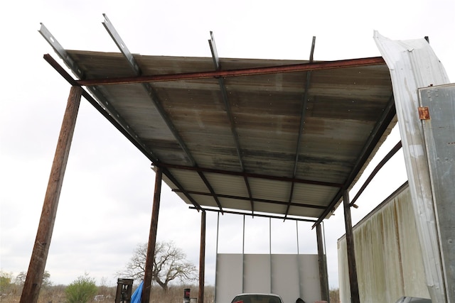 view of parking / parking lot with a carport