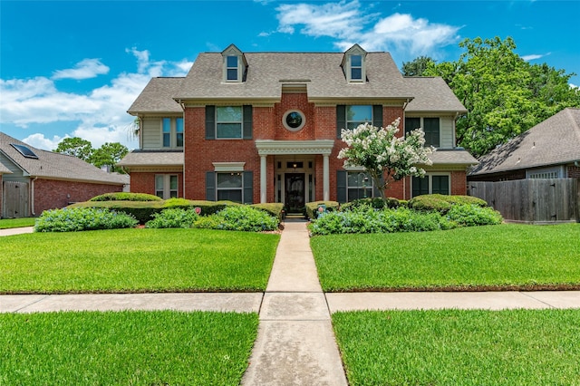 view of front of house with a front lawn