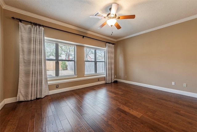 unfurnished room featuring dark hardwood / wood-style flooring, ornamental molding, and ceiling fan