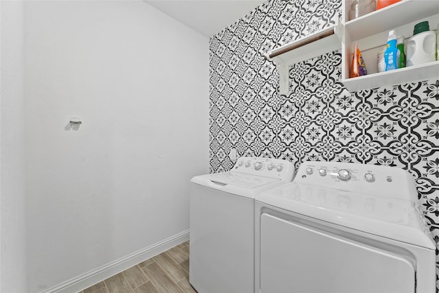 laundry room with washing machine and clothes dryer