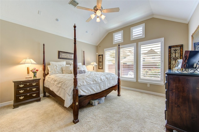 carpeted bedroom featuring vaulted ceiling, ceiling fan, and ornamental molding