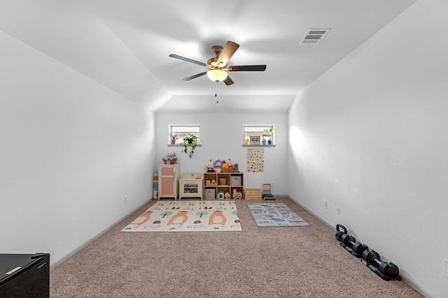 game room featuring carpet, ceiling fan, and vaulted ceiling