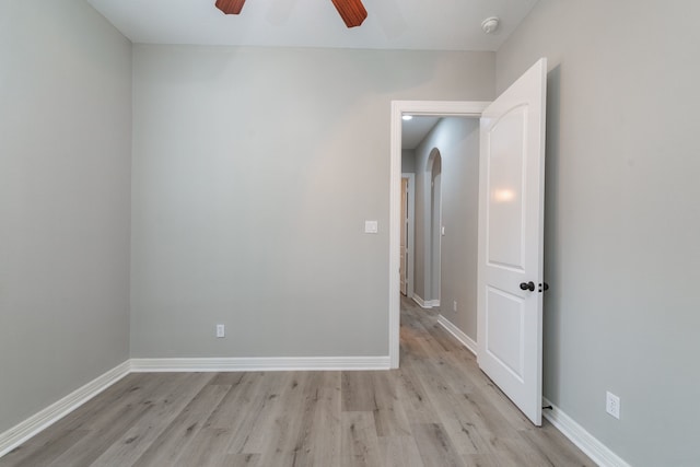 unfurnished room with ceiling fan and light hardwood / wood-style floors