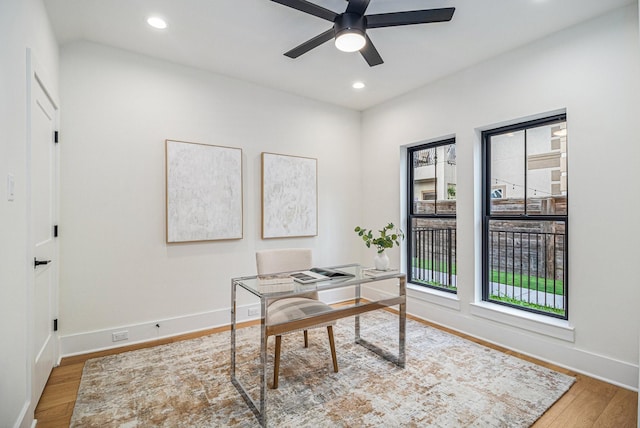 office space featuring hardwood / wood-style floors and ceiling fan