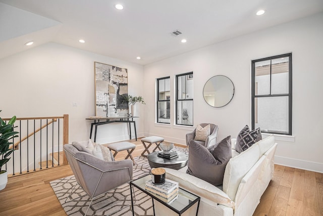 living room with light hardwood / wood-style floors