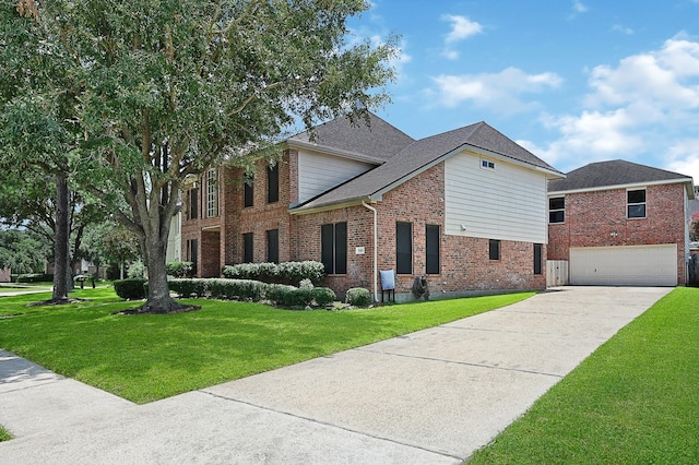 view of front facade featuring a front lawn and a garage