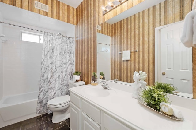 full bathroom featuring toilet, shower / bathtub combination with curtain, tile patterned floors, and vanity