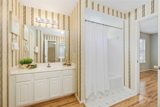 bathroom with vanity, shower / tub combo, and hardwood / wood-style flooring