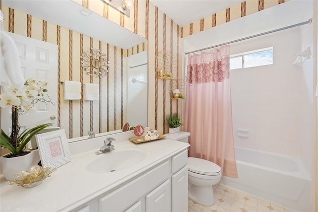 full bathroom featuring shower / bath combo with shower curtain, toilet, and vanity