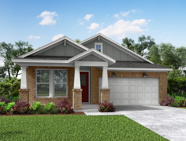 craftsman-style home featuring a garage and a front lawn