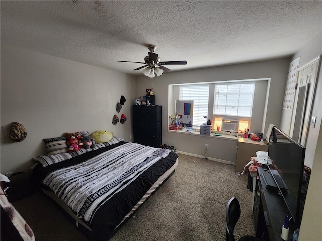 carpeted bedroom with a textured ceiling and ceiling fan