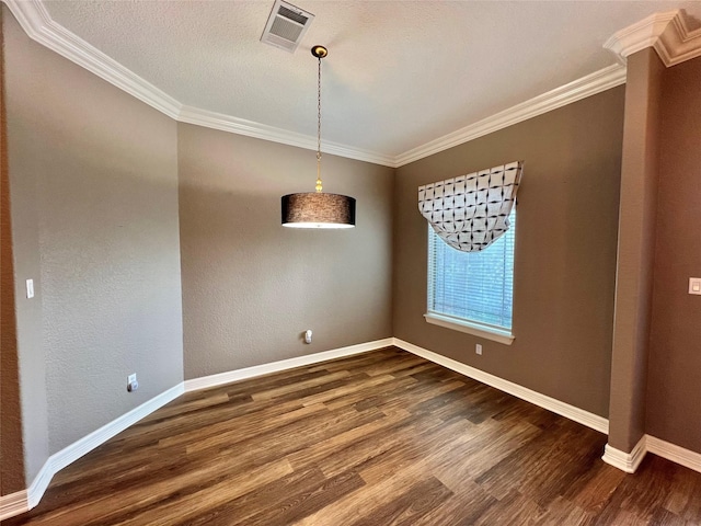 unfurnished dining area featuring dark hardwood / wood-style flooring and ornamental molding