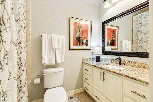 bathroom featuring tile patterned floors, vanity, toilet, and curtained shower