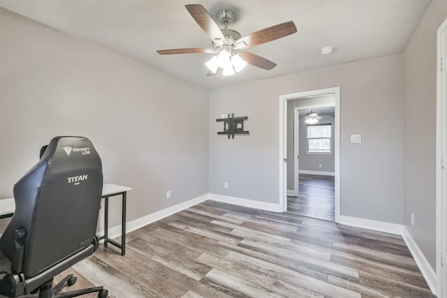 office space with ceiling fan and hardwood / wood-style flooring