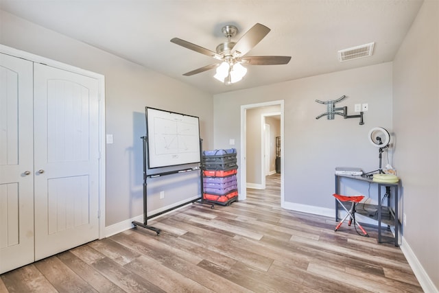 interior space featuring ceiling fan and light hardwood / wood-style flooring