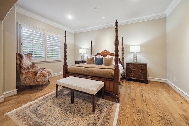 bedroom with light wood-type flooring and ornamental molding