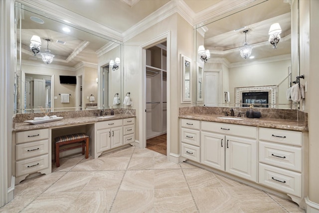 bathroom with vanity and crown molding