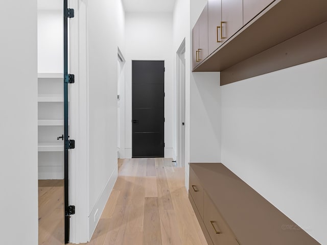 hallway featuring light hardwood / wood-style flooring