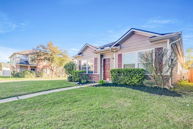 view of front of property with a front lawn