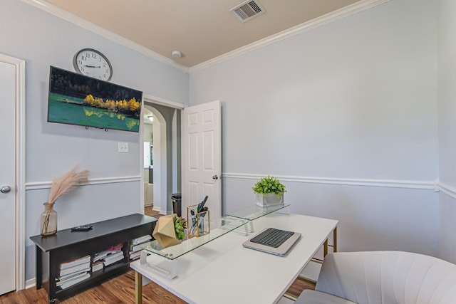 office featuring hardwood / wood-style floors and ornamental molding