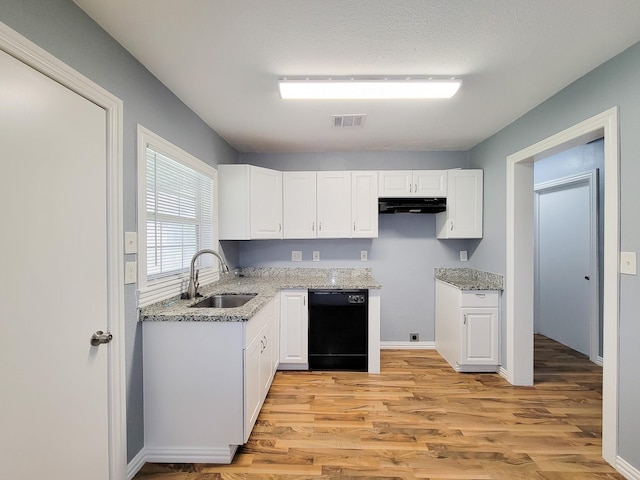 kitchen with white cabinetry, dishwasher, sink, light hardwood / wood-style floors, and light stone countertops