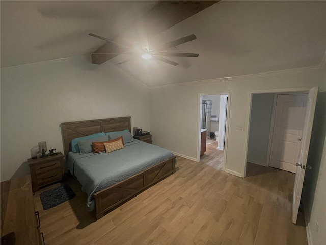 bedroom featuring ceiling fan, crown molding, light hardwood / wood-style floors, vaulted ceiling, and a closet