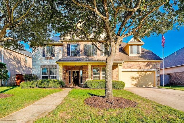 view of front of home featuring a front lawn and a garage