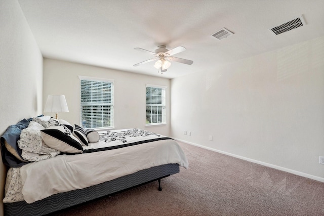 bedroom featuring ceiling fan and carpet floors