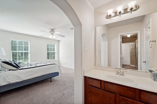 bathroom with vanity and ceiling fan