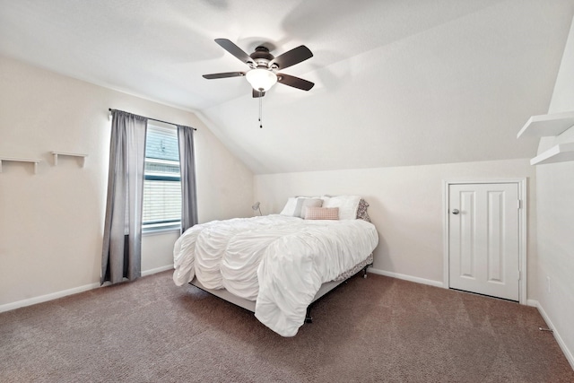 bedroom with carpet flooring, ceiling fan, and lofted ceiling