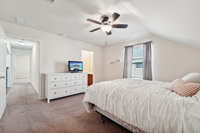 carpeted bedroom featuring ceiling fan and lofted ceiling