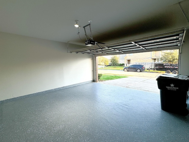 garage featuring a garage door opener