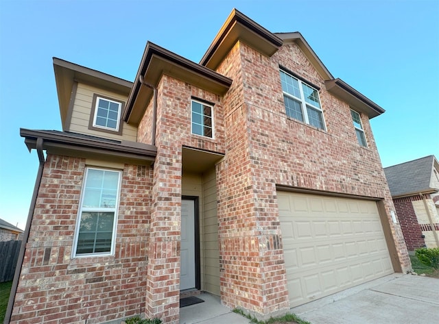 view of front of property featuring a garage