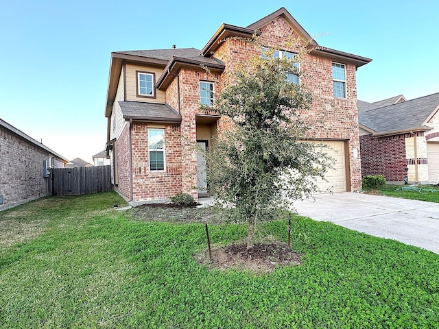 view of front of house featuring a front lawn and a garage